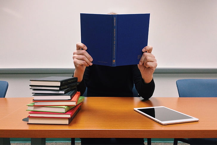 Person reading at a desk