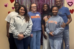 A long-time A+ family and their students' teachers